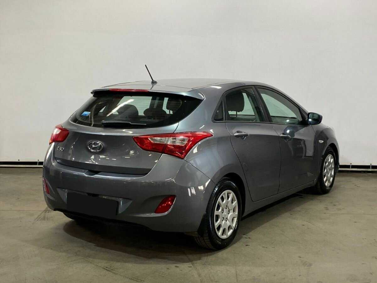 Купить Hyundai i30, 2013, 142 135 км.. Фото: #3